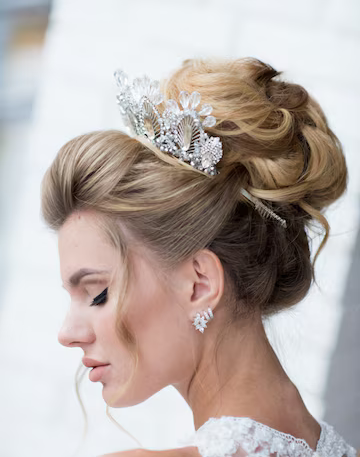 beautiful-blonde-bride-with-high-hair-precious-silver-wreath-her-hair_8353-7270